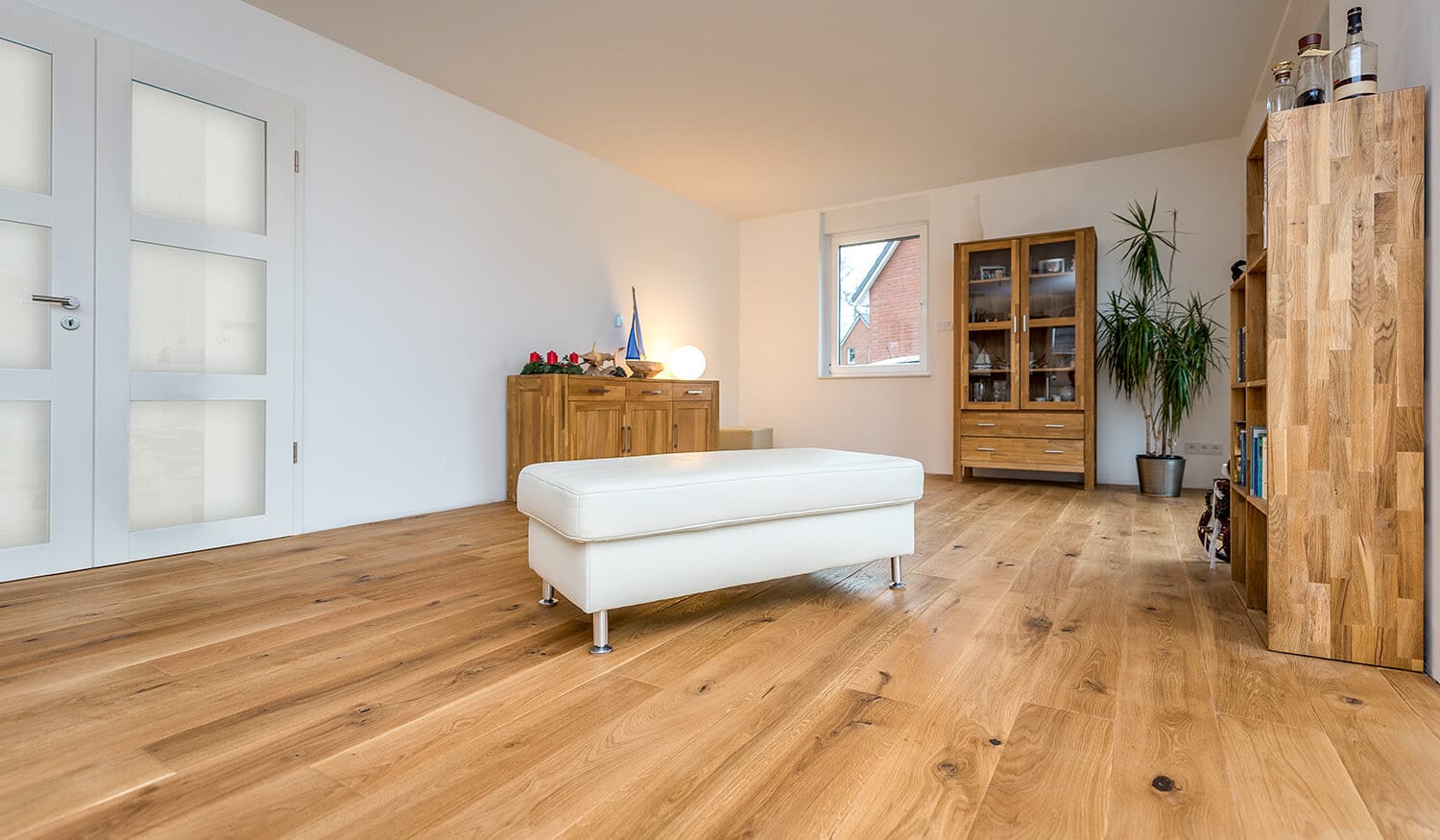 Precious wood flooring laid in fireplace room