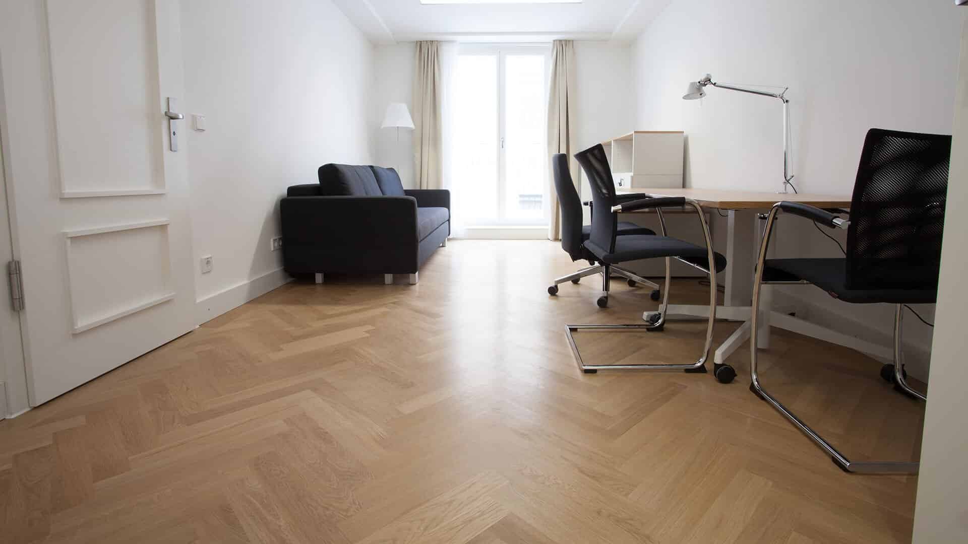 Solid parquet sofa laid in an office
