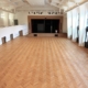 Renovation of a town hall with strip parquet