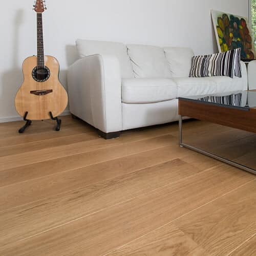 Plank with guitar and sofa in the living room