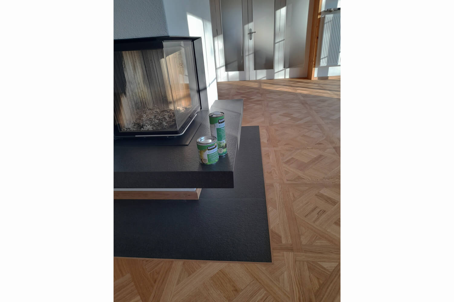 Residenzparkett mit Pflegeöl auf Kamin in München